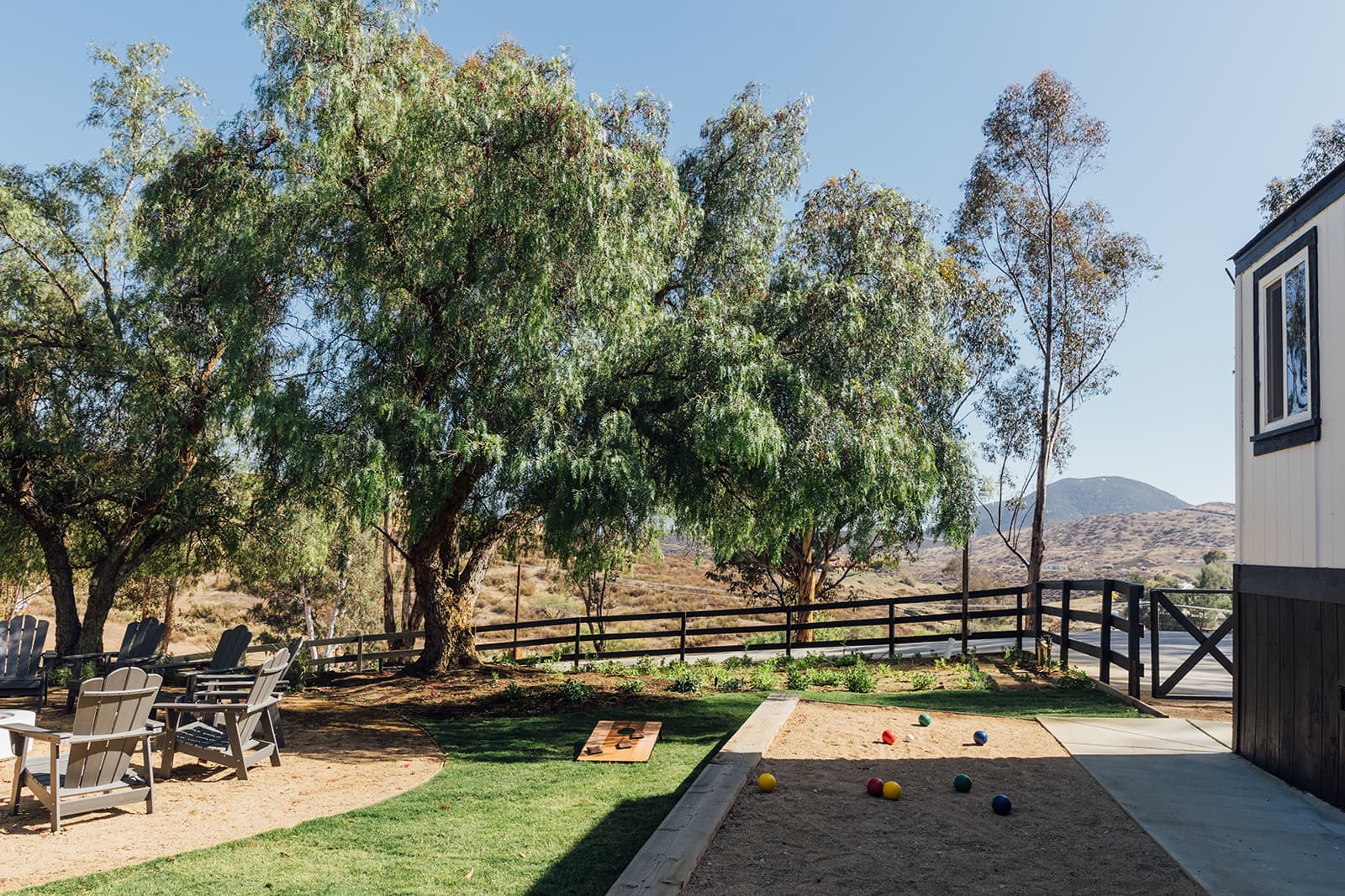 Bocce and cornhole on the lawn
